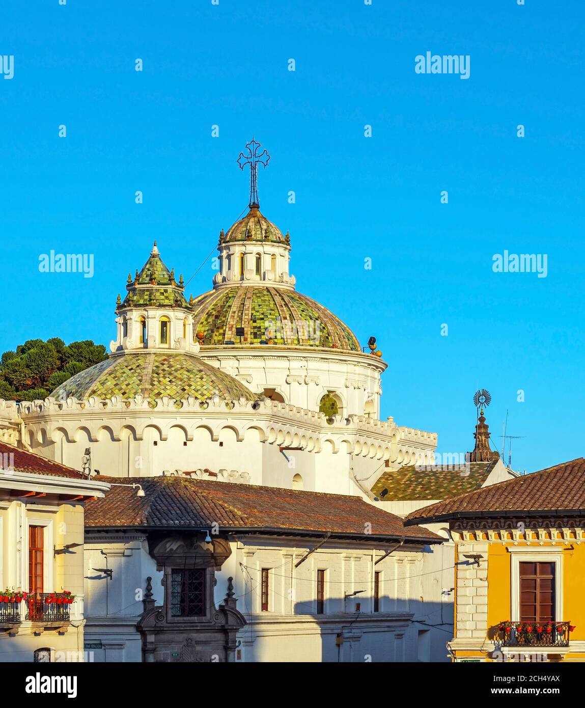 Domes of the Compania de Jesus church with mosaic inlay at sunset, Quito, Ecuador. Stock Photo