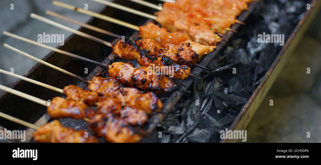 indonesia chicken satay grilled over a charcoal fire, tasty and