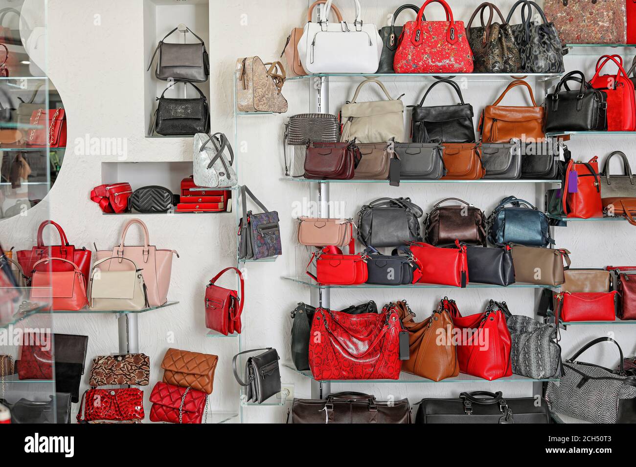 Premium Photo  Fashionable bags on the showcase. elegant, stylish and  luxurious accessories. front view.