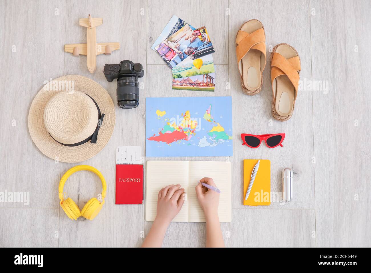 Woman planning vacation, top view Stock Photo