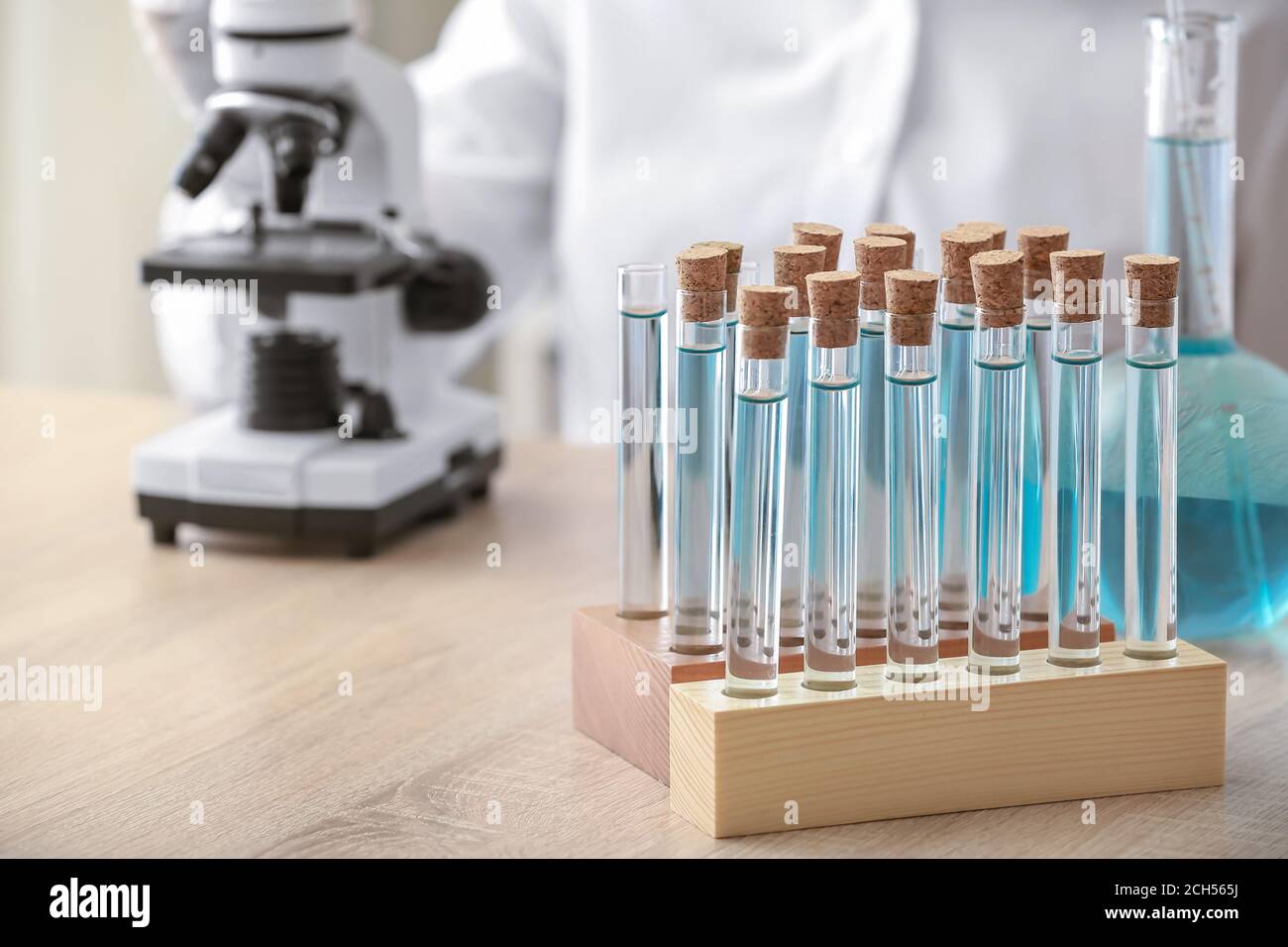 Test tubes on table in laboratory Stock Photo - Alamy