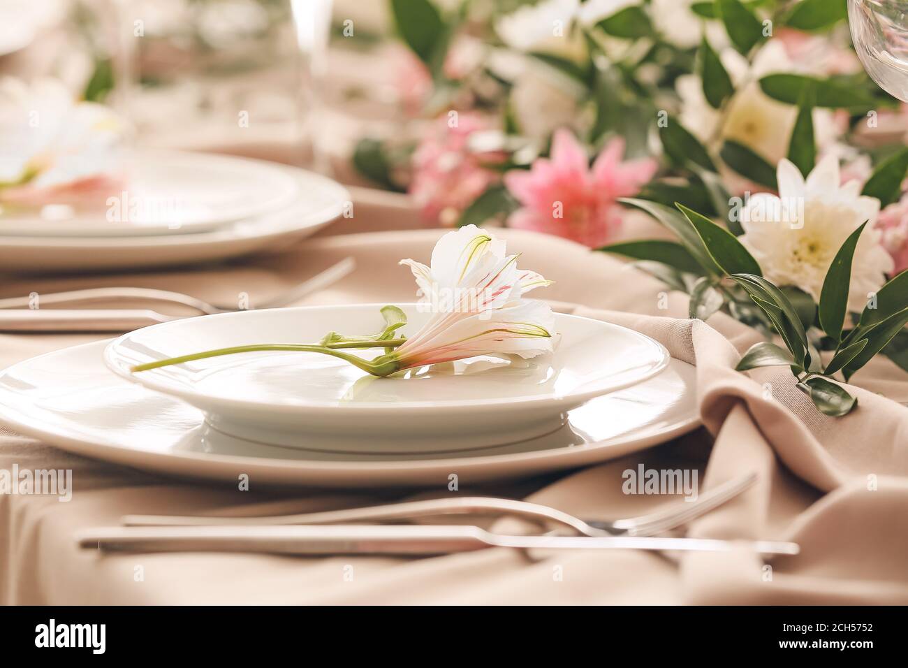 Beautiful table setting in restaurant Stock Photo - Alamy