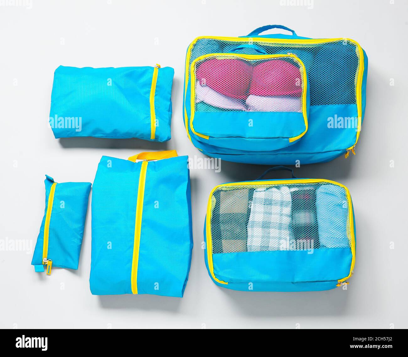 Set of travel organizers for belongings on white background Stock Photo