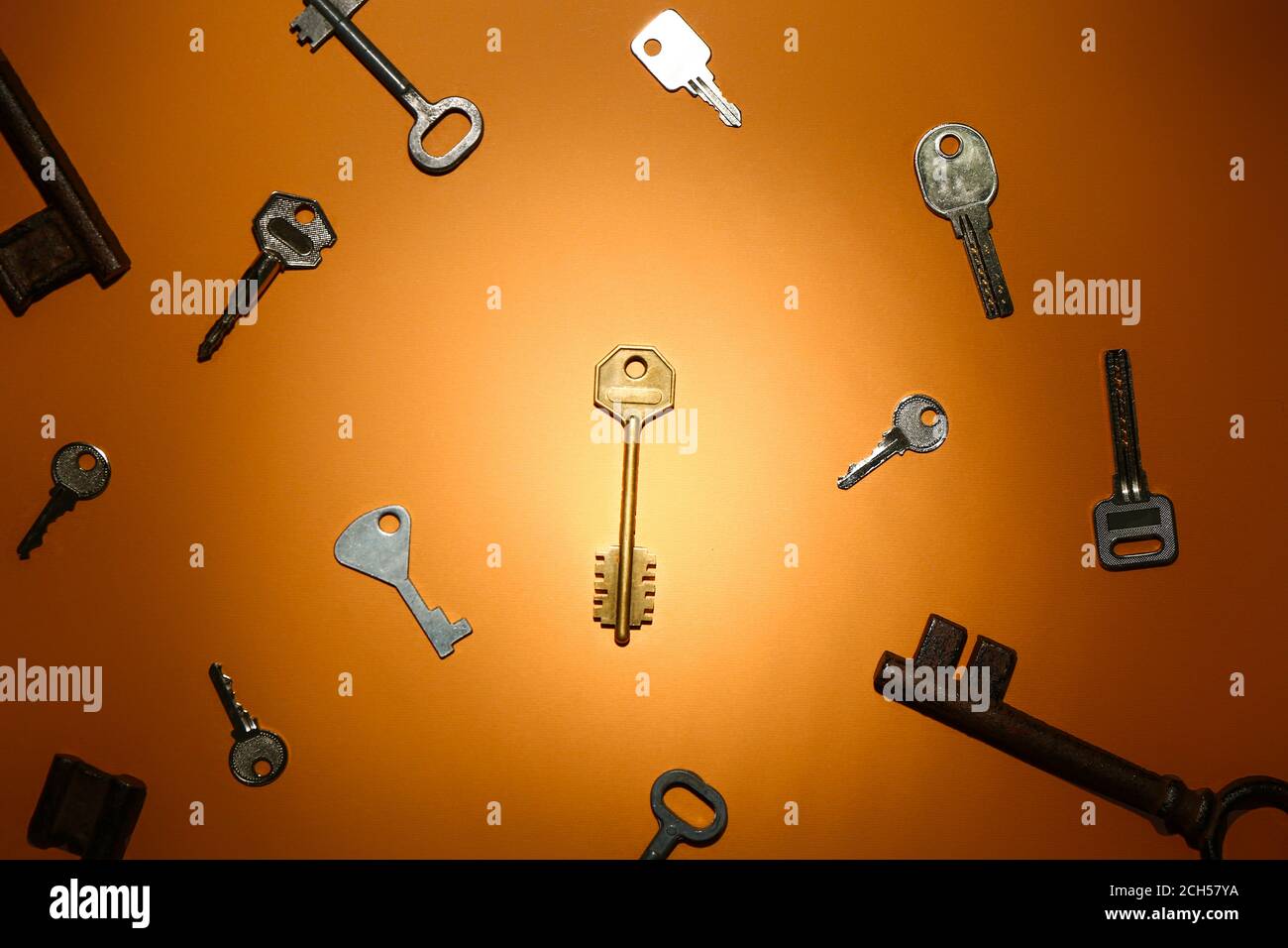 Different keys on color background Stock Photo