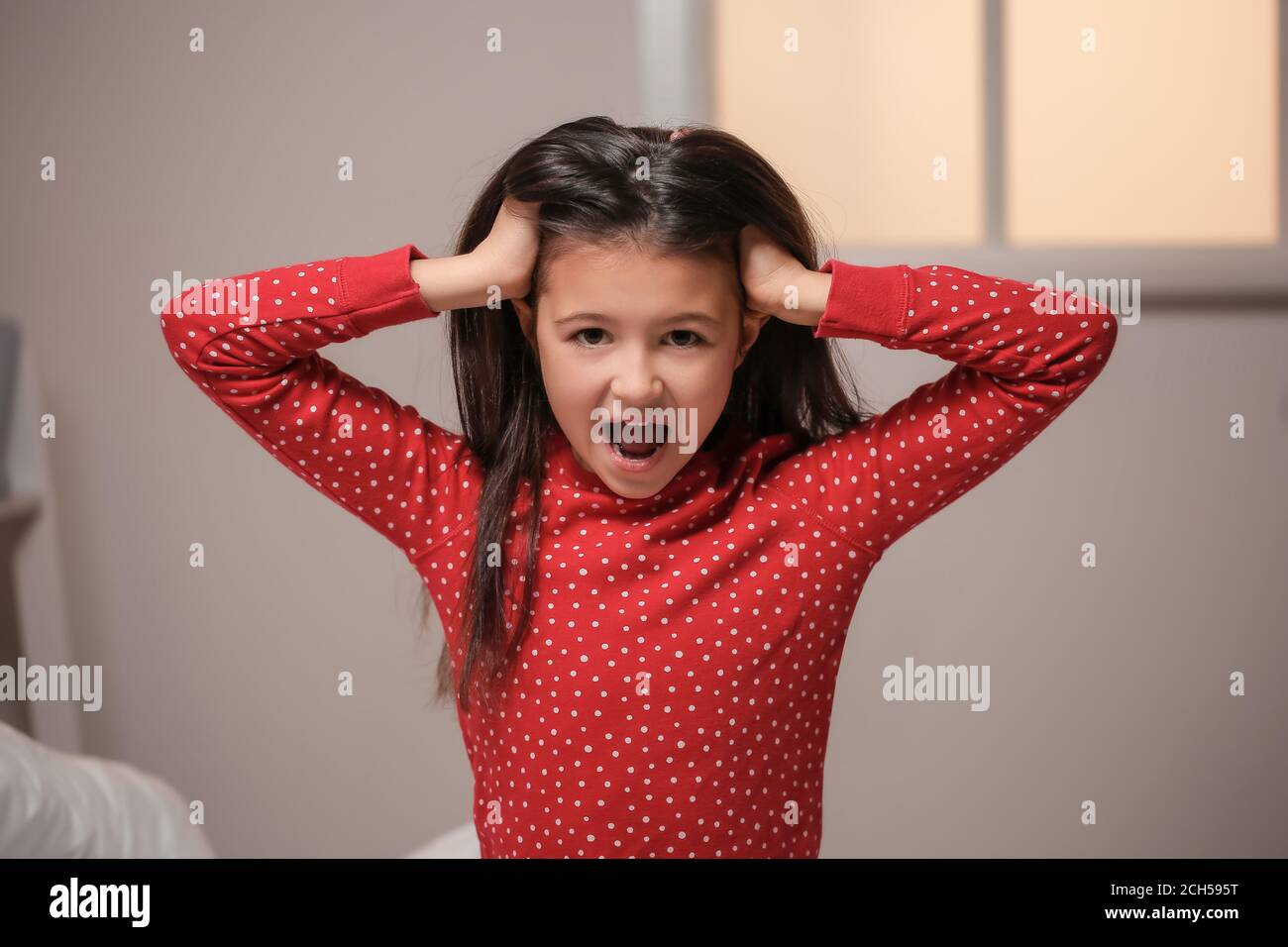 Screaming little girl suffering from sleep disorder in bedroom Stock Photo Alamy