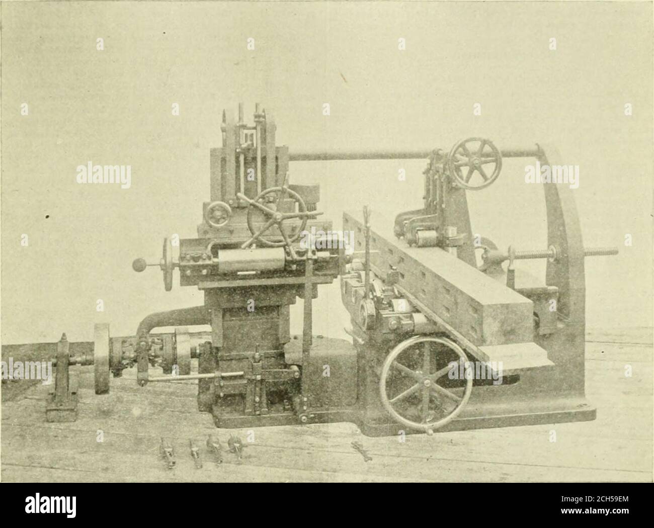 . American engineer and railroad journal . ines isdriven by a manilla rope con^^isting of 14 strands, four of whichrun over pulleys on each Moor to drive the shafting on thatdoor. The Company has provided well appointed and comfortableofhces and drawing-room, and all the floors of the shop arewell lighted and warmed, and have the thrifty and prosperousappearance for which Philadelphia machine works are noted. The engraving given Is from a photograph of a hollow-chiselmortising machine made by the Company, and a comparisonbetween It and the machines made some time ago for the samepurpose will s Stock Photo