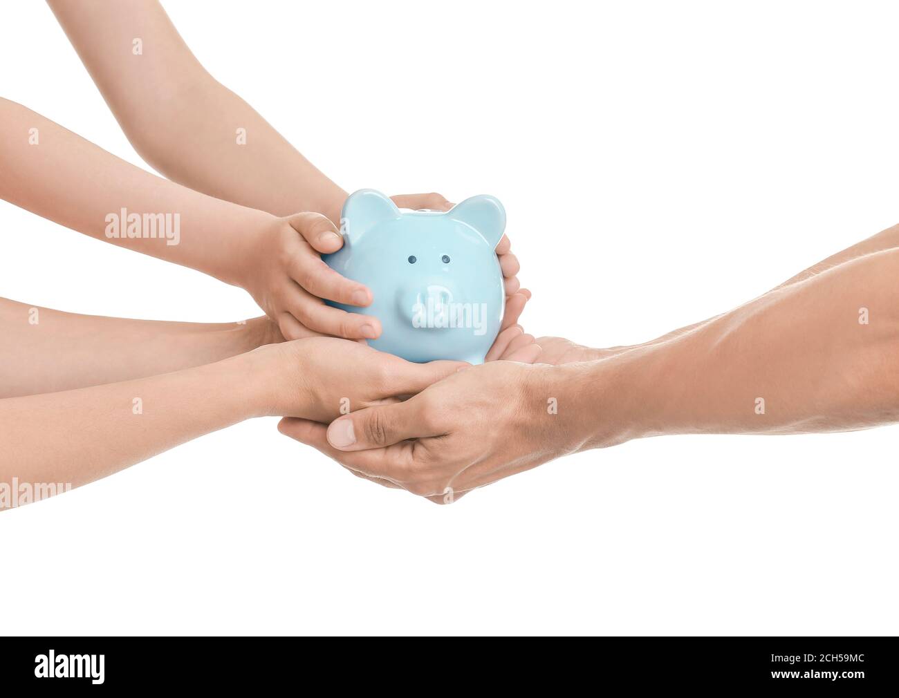 Hands of family with piggy bank on white background Stock Photo - Alamy