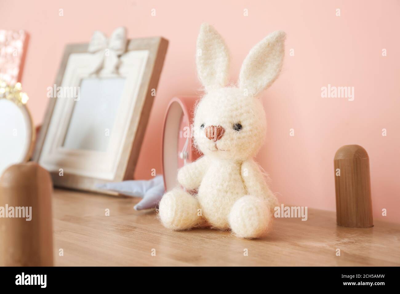 Cuddly toy on shelf in children's room Stock Photo Alamy