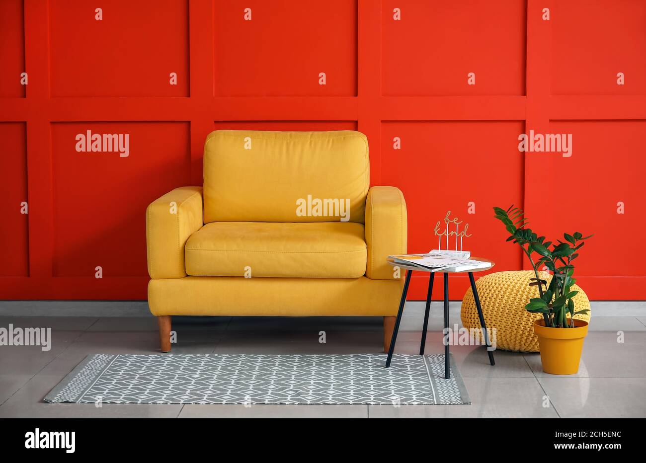 Modern armchair in interior of room Stock Photo - Alamy