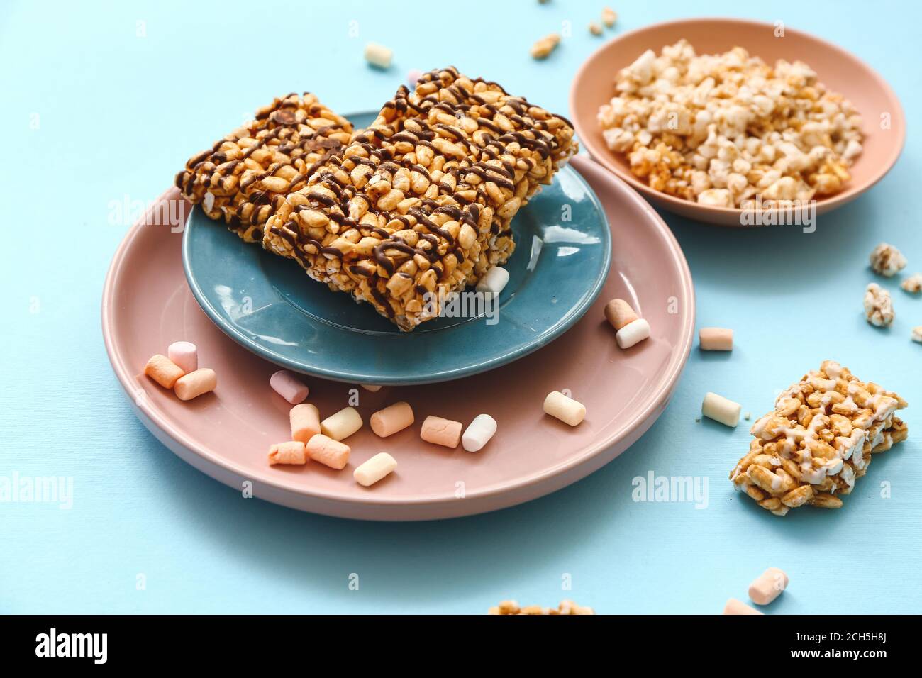 Crispy rice bars on color background Stock Photo - Alamy