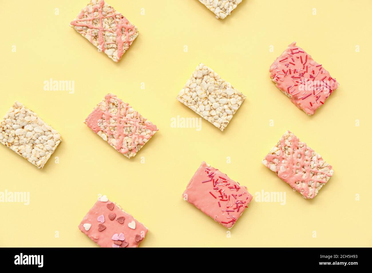 Crispy rice bars on color background Stock Photo - Alamy