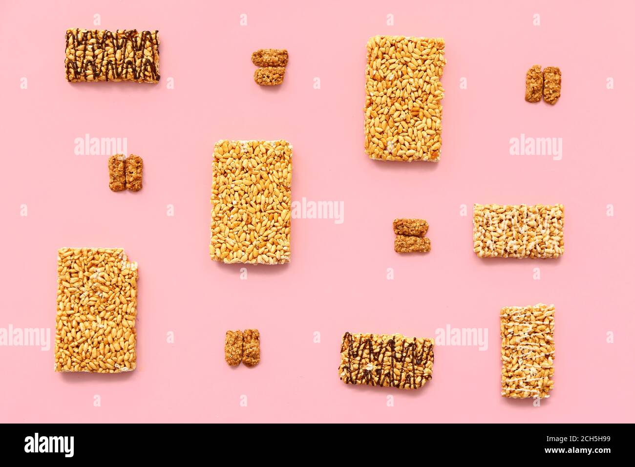 Crispy rice bars on color background Stock Photo - Alamy