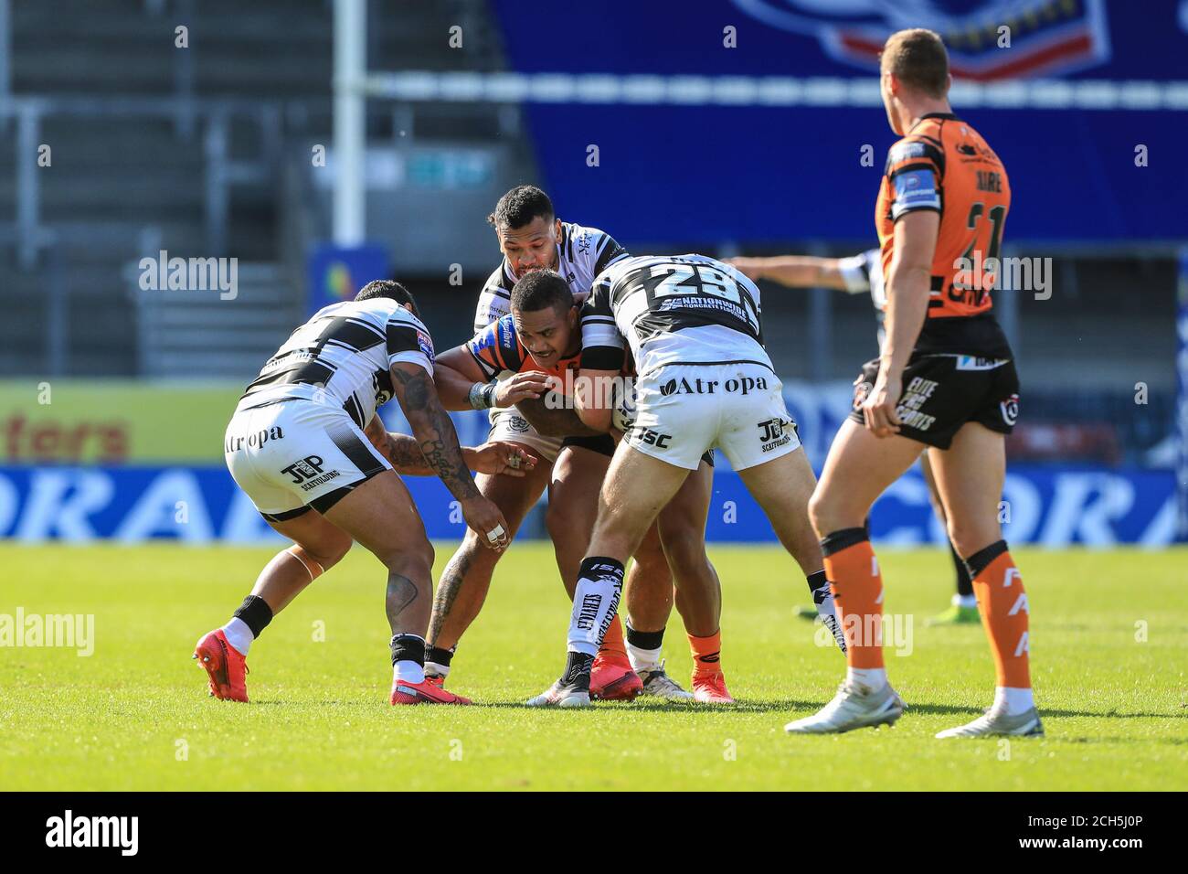 Peter Mata’utia (3) of Castleford Tigers is tackled by Gareth Ellis (29) of Hull FC Stock Photo