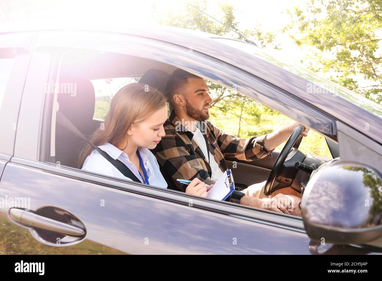 Instructor conducting driver licence test Stock Photo Alamy