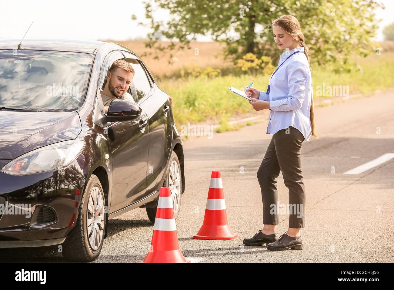 Instructor conducting driver licence test Stock Photo Alamy