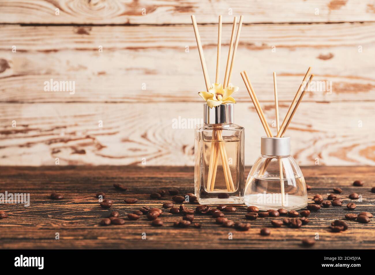Different reed diffusers on table Stock Photo