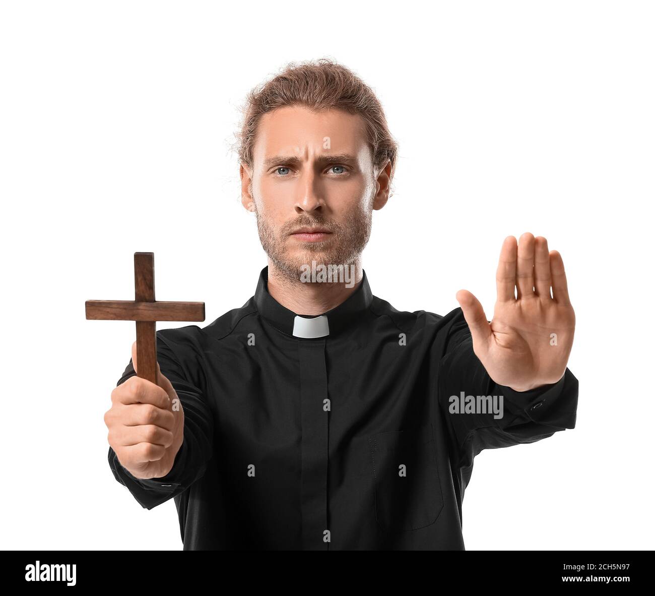 Male priest with cross on white