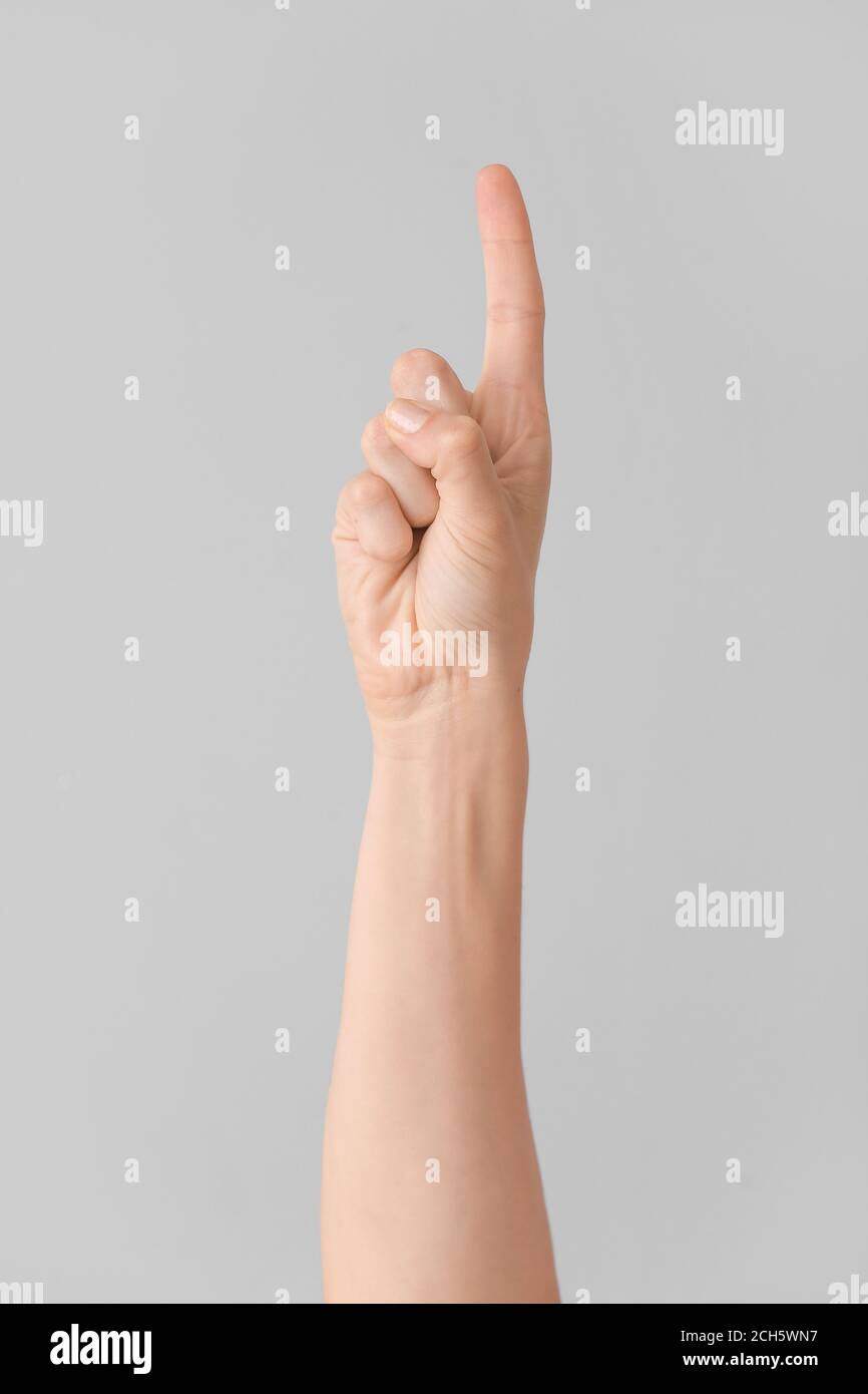 Hand showing letter Z on grey background. Sign language alphabet Stock ...