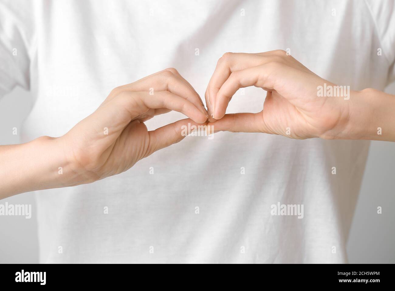 Young deaf mute woman using sign language, closeup Stock Photo Alamy