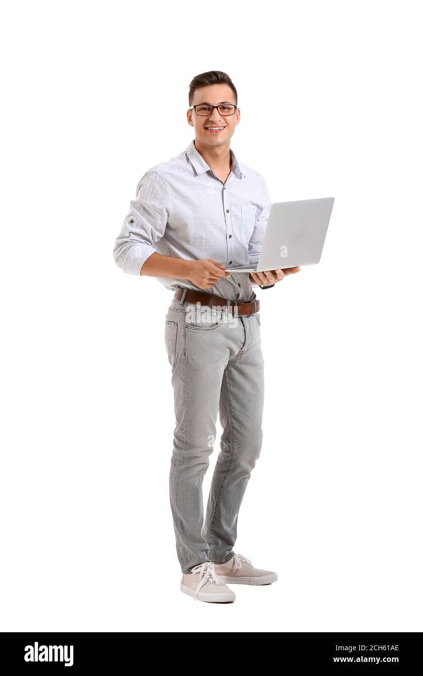 Male programmer with laptop on white background Stock Photo - Alamy
