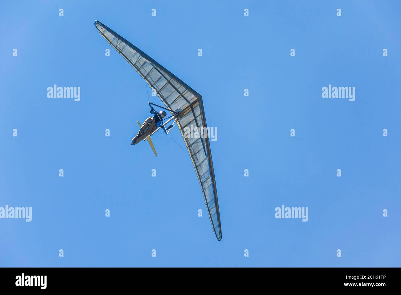 Hang glider wing silhouette. Sport hangglider wing making maneuvers Stock Photo