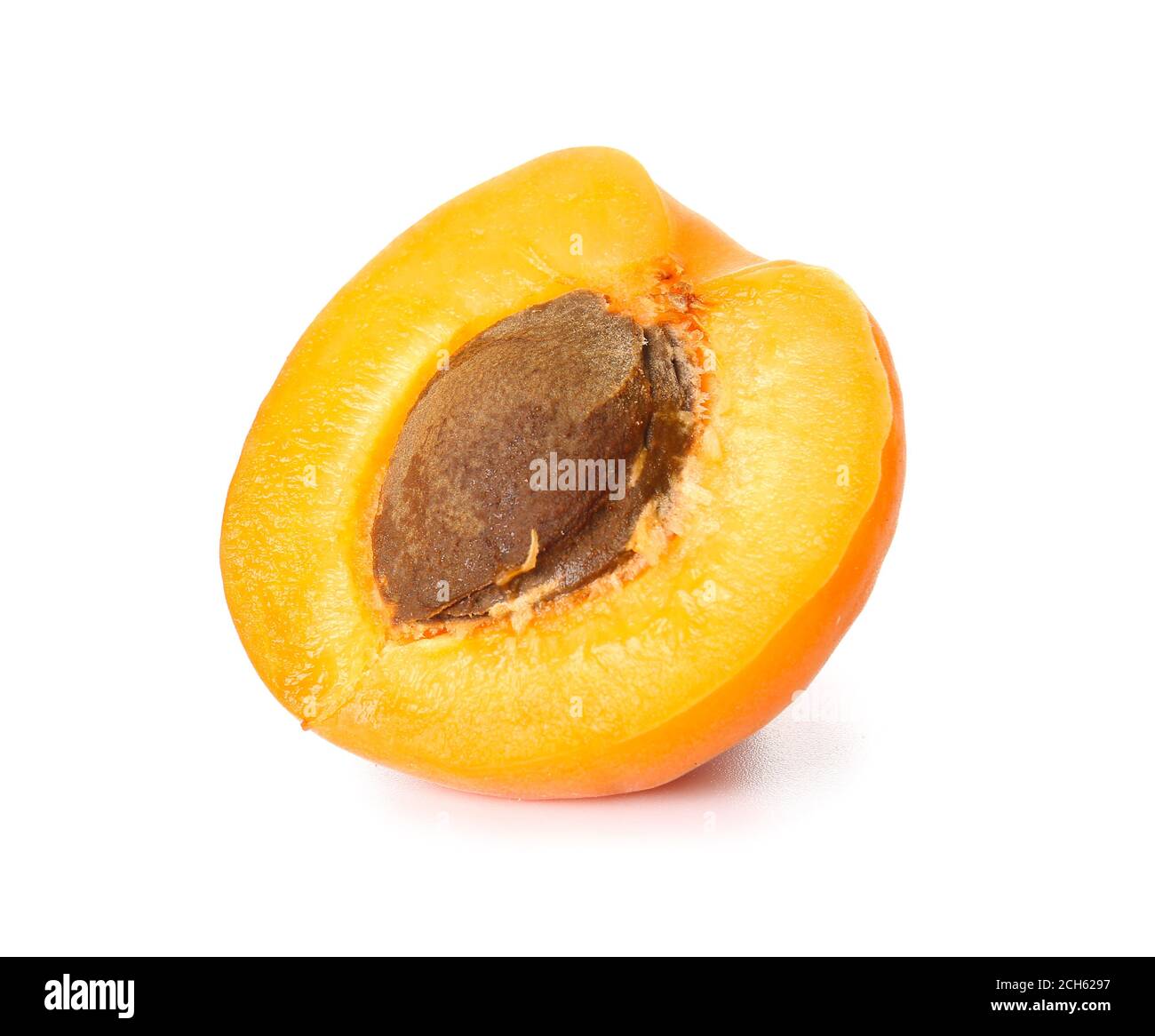Half of ripe apricot on white background Stock Photo - Alamy