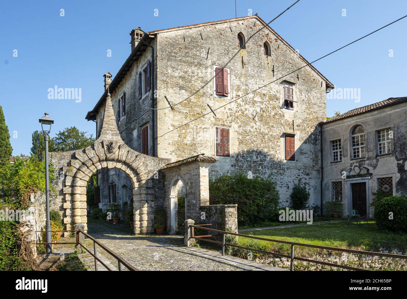 ancient entrance gate to the medieval rural village of Strassoldo, Italy Stock Photo