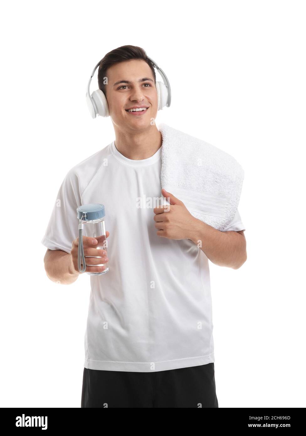 Sporty young man with bottle of water on white background Stock Photo ...