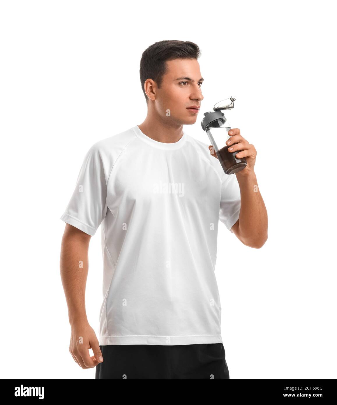 Sporty young man with bottle of water on white background Stock Photo ...