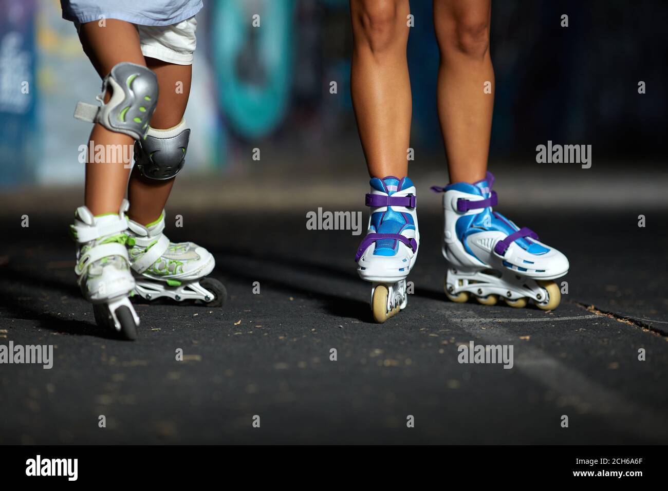 Roller skate legs in skatepark in the evening Stock Photo Alamy
