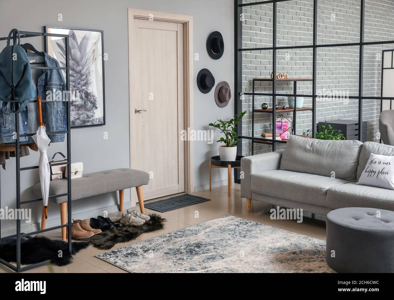Stylish interior of modern hall in studio apartment Stock Photo - Alamy