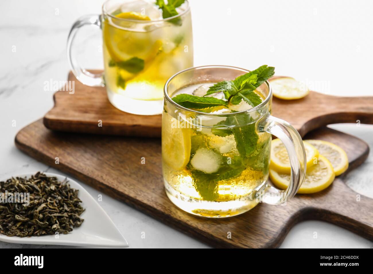 Cup of tasty cold ice tea on table Stock Photo - Alamy
