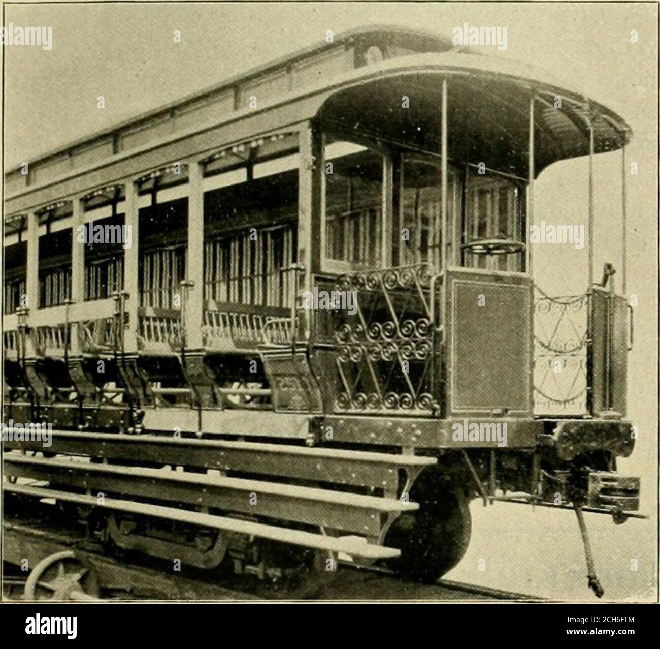 . The street railway review . TRAINS AND uERlIi:AD CONSTRUCTION AT SWITCHES- four are already equipped for service. The open carsare sixteen reversible bench cars, built by the Barney &Smith Company, of Dayton, O., and six are now receiv-ing their equipment. The open cars resemble thefamiliar city trolley car, but have a flight of three con- especially designed for heavy work, and are similar tothose in use on the Metropolitan Elevated Railroad inChicago. The drawbar pull of the double motor cars is4,000 pounds, that of the four motor cars 8,000 pounds.The motors are 100 horse power each, or Stock Photo