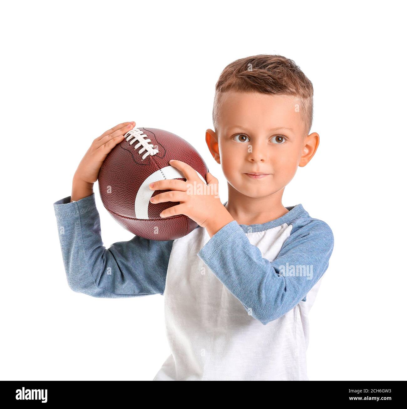Little boy with rugby ball on white background Stock Photo Alamy