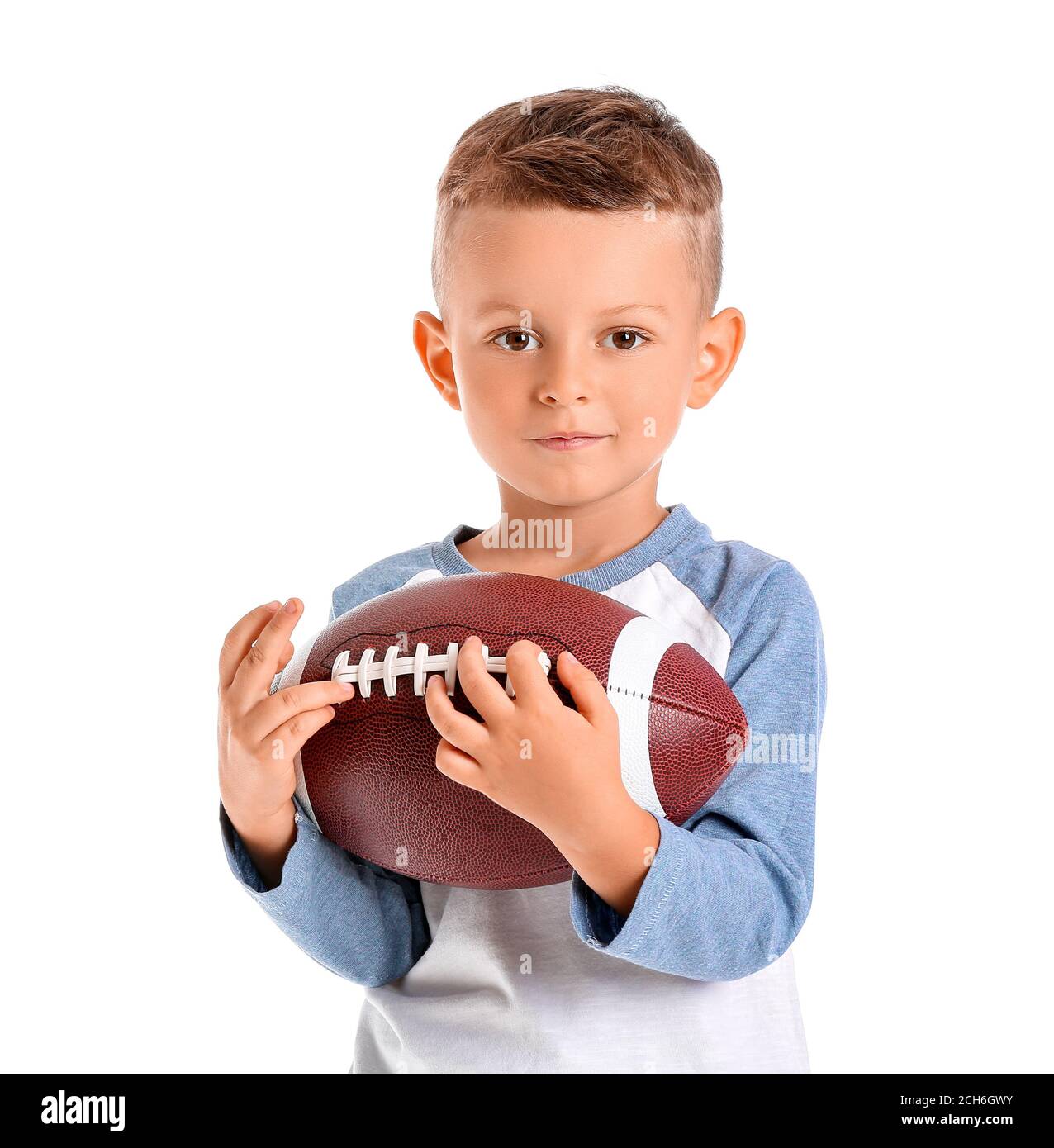 Little boy with rugby ball on white background Stock Photo Alamy