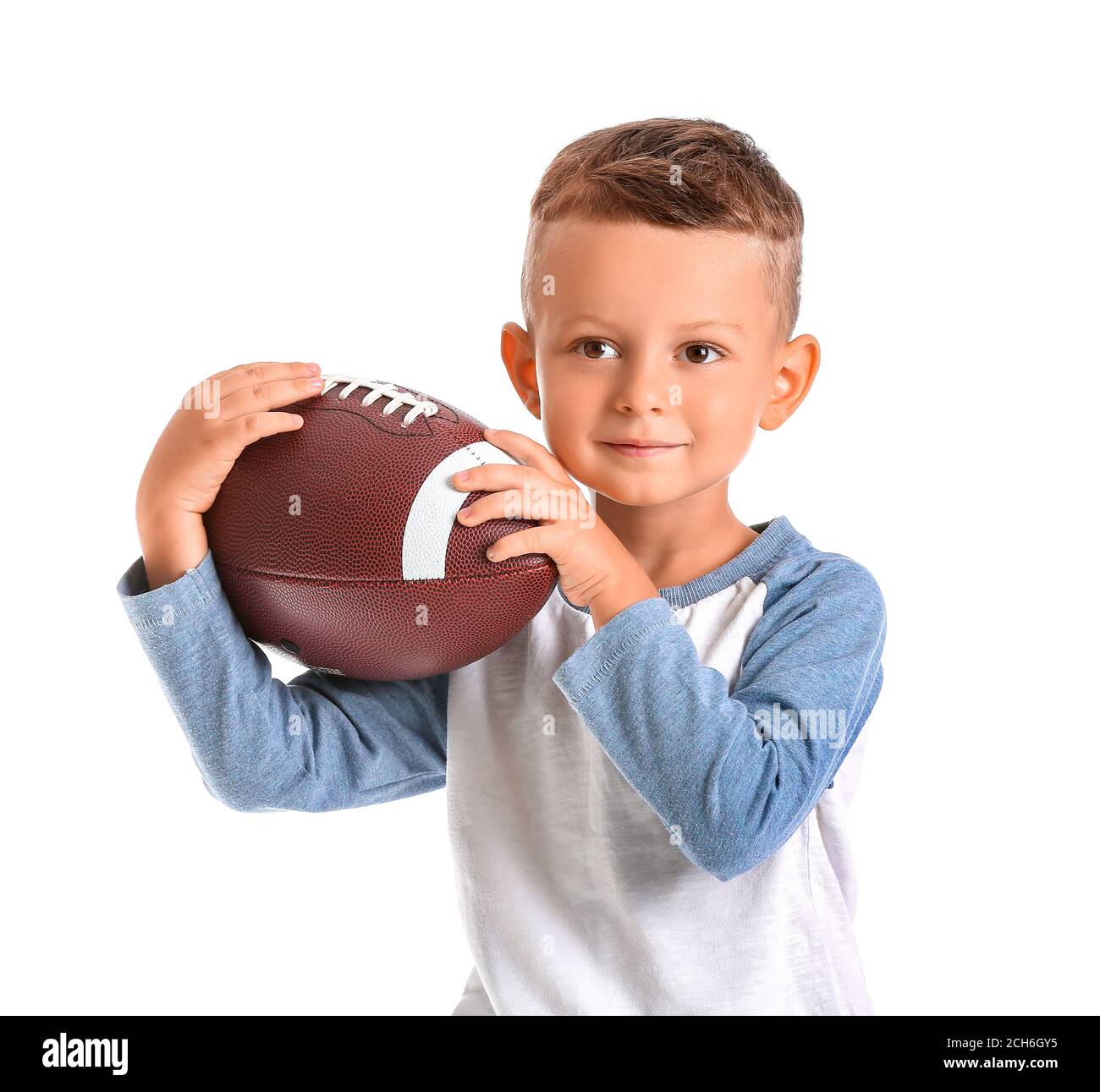 Little boy with rugby ball on white background Stock Photo Alamy