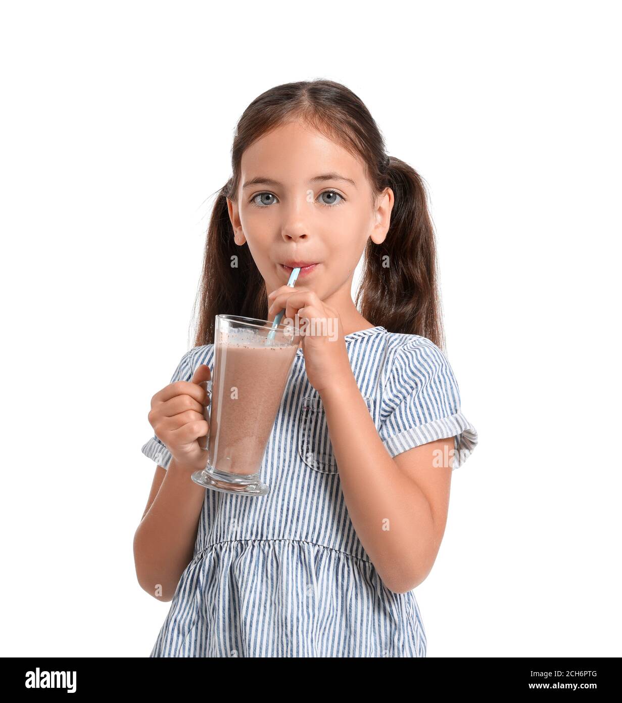 Little girl drinking chocolate milk on white background Stock Photo Alamy