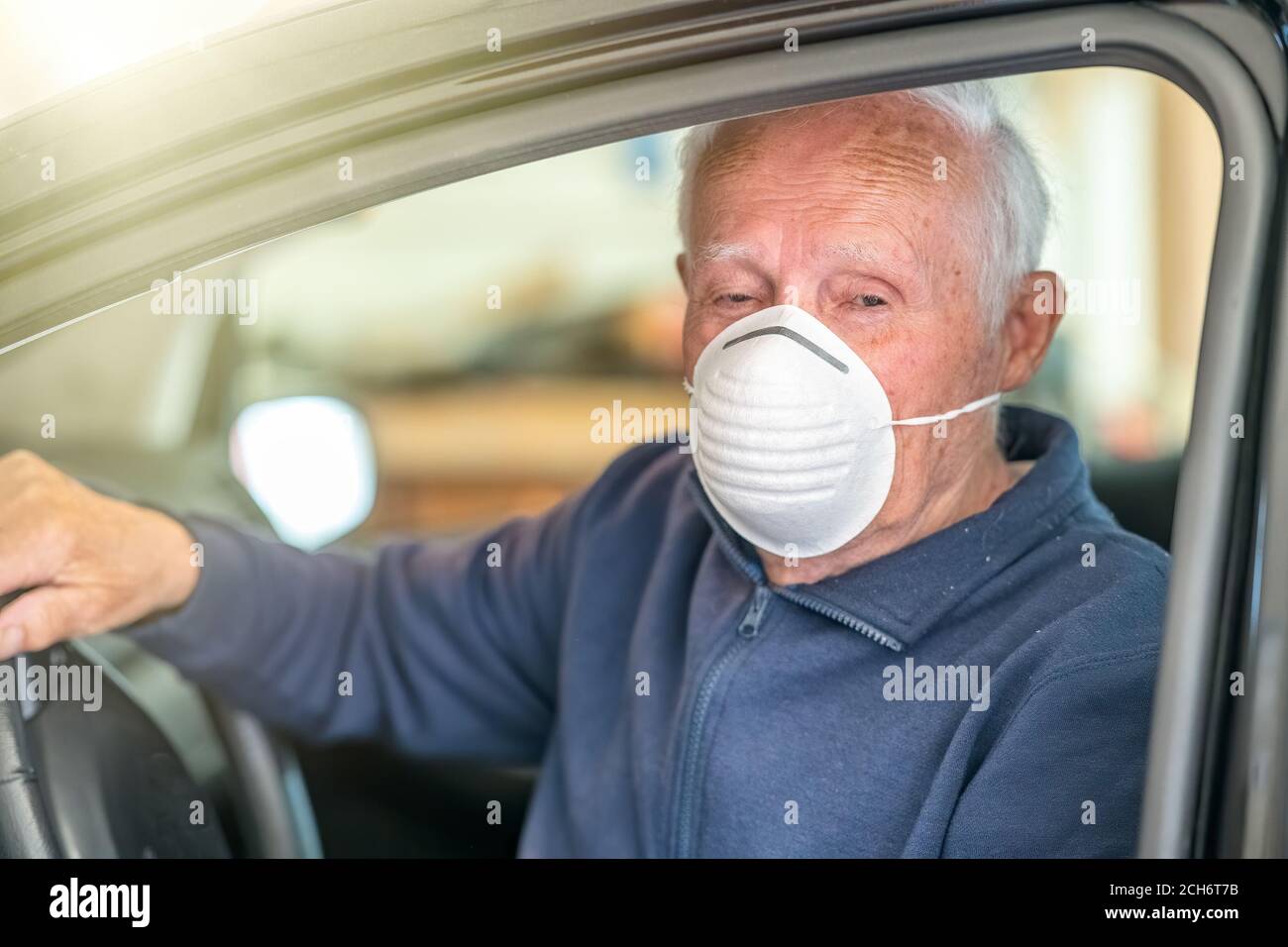 Elderly man holding car hi-res stock photography and images - Alamy