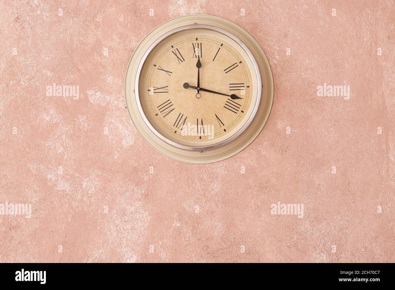 Modern clock hanging on wall Stock Photo Alamy