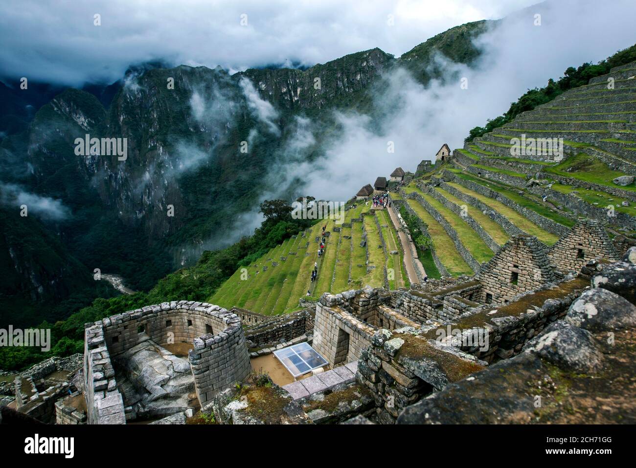 The ancient ruins and stone terraces of Machu Picchu which is a 15th ...