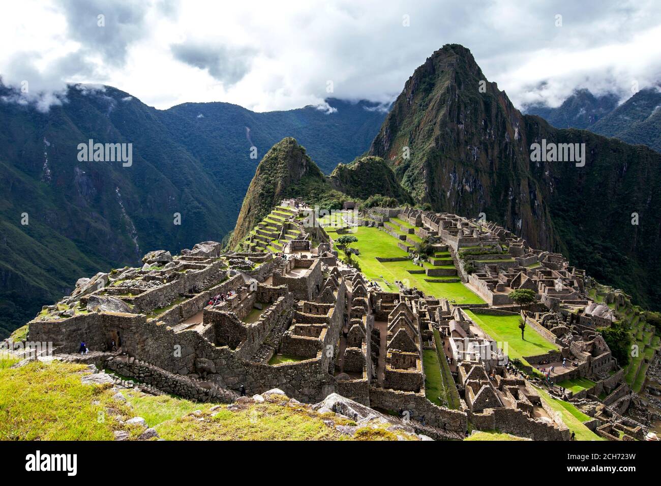 The ancient ruins of residential houses at Machu Picchu which is a  15th-century Inca site located in the Sacred Valley of the Incas in Peru  Stock Photo - Alamy
