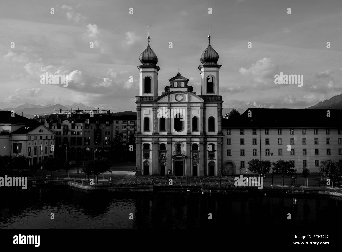 City of Lucerne with River and Church Jesuitenkirche in a Sunny Day in Switzerland. Stock Photo