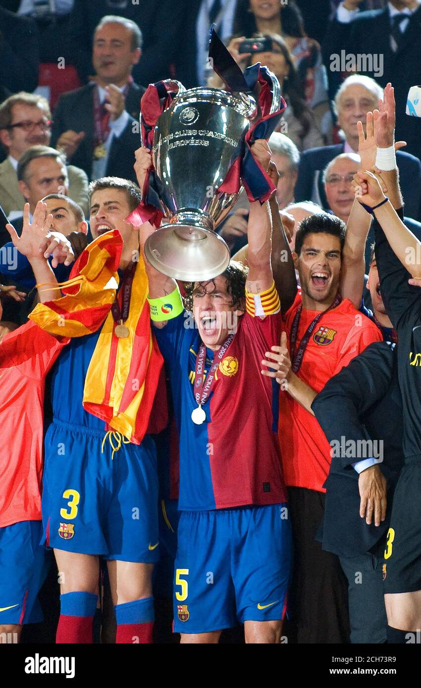 Carles Puyol lifts the European Cup for Barcelona. Manchester United v Barcelona. Champions League Final, Rome. 27/5/2009. CREDIT : MARK PAIN / ALAMY Stock Photo