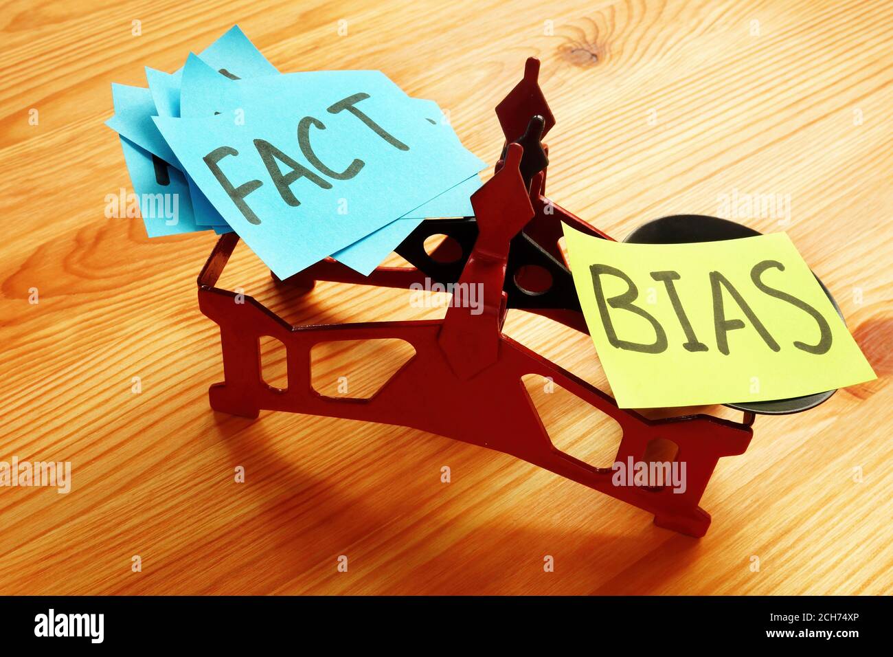 The scales on which lie a lot of facts and bias. Stock Photo