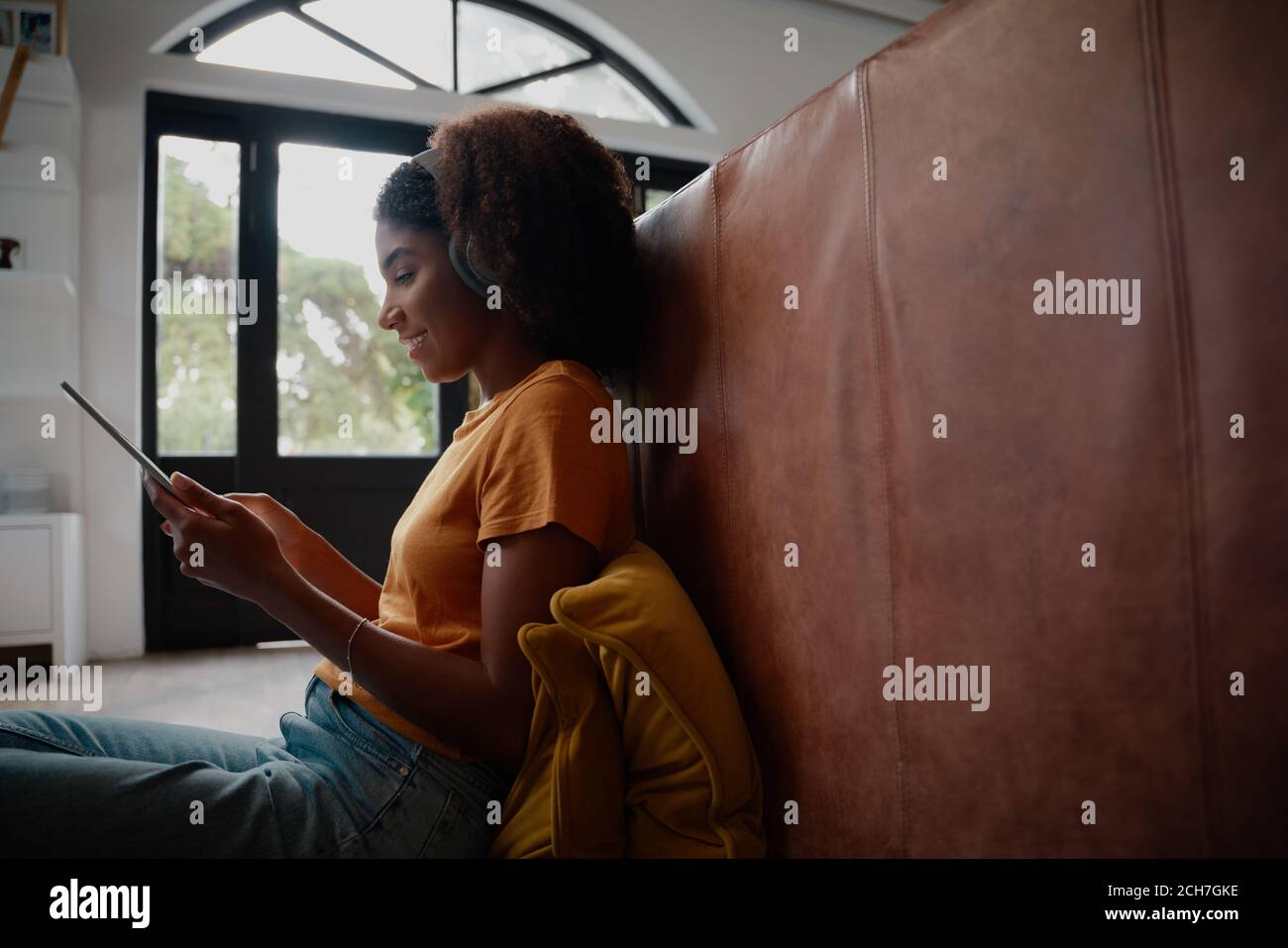 African woman side view sitting hi-res stock photography and images - Alamy