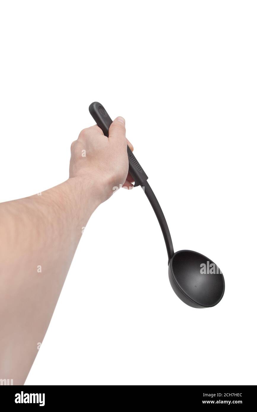 Male hand holding black soup ladle isolated on white with selective focus  Stock Photo - Alamy