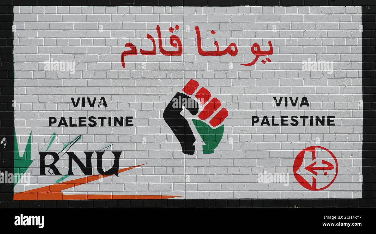 A pro Palestine Mural in Belfast as Loyalist and Republican groups take