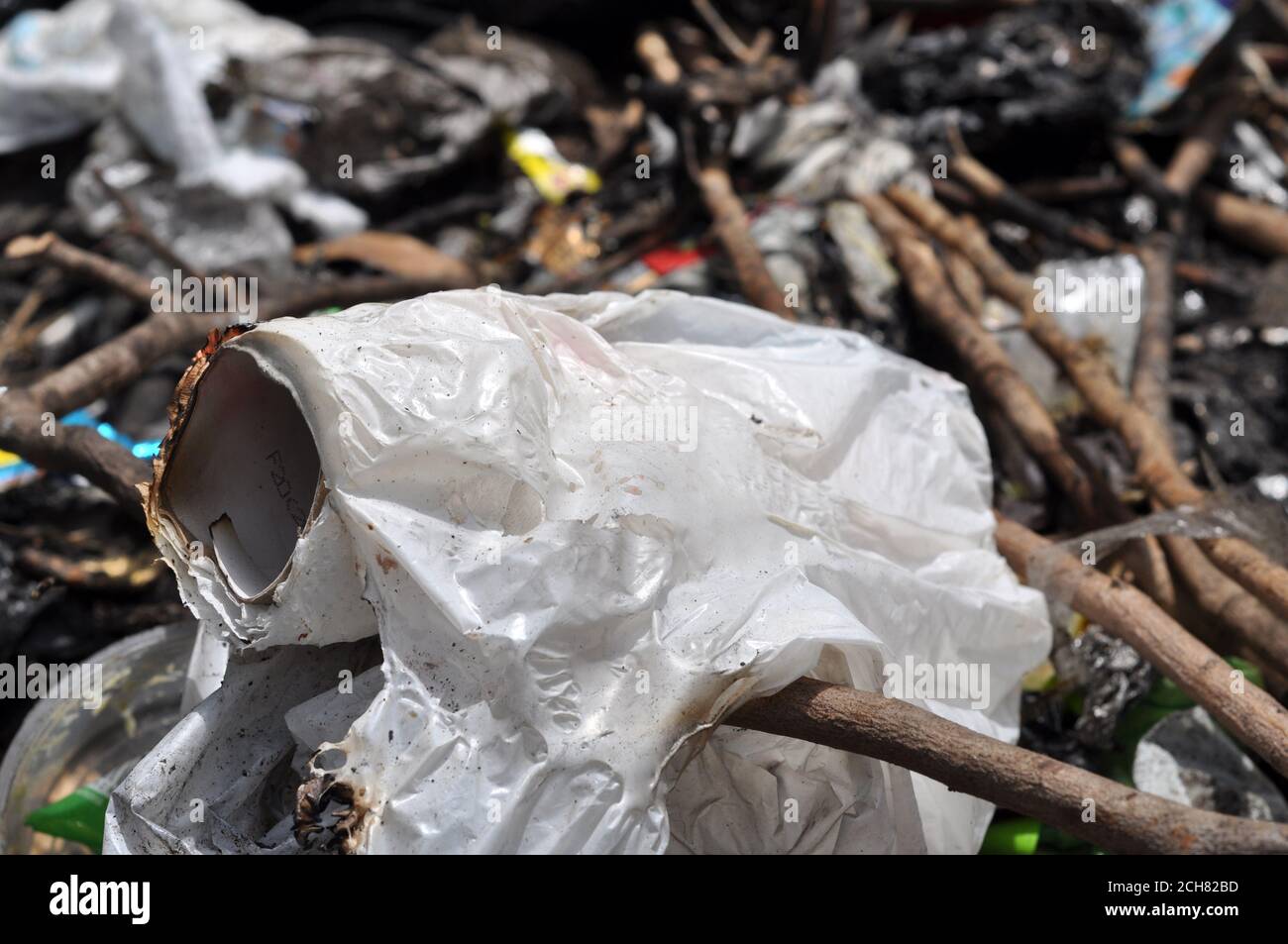 Ciamis, Indonesia - September 14, 2020: Burnt plastic waste in landfills,  incomplete burning of plastic waste becomes pollution for the soil Stock  Photo - Alamy