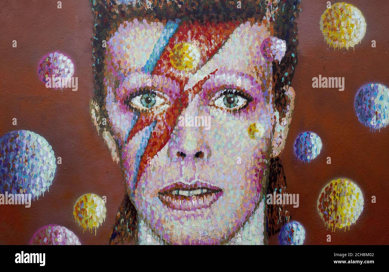 A mural of David Bowie on the wall of a Morley's store in Brixton, London, the singers birthplace, after the rock star died following an 18-month battle with cancer. Stock Photo