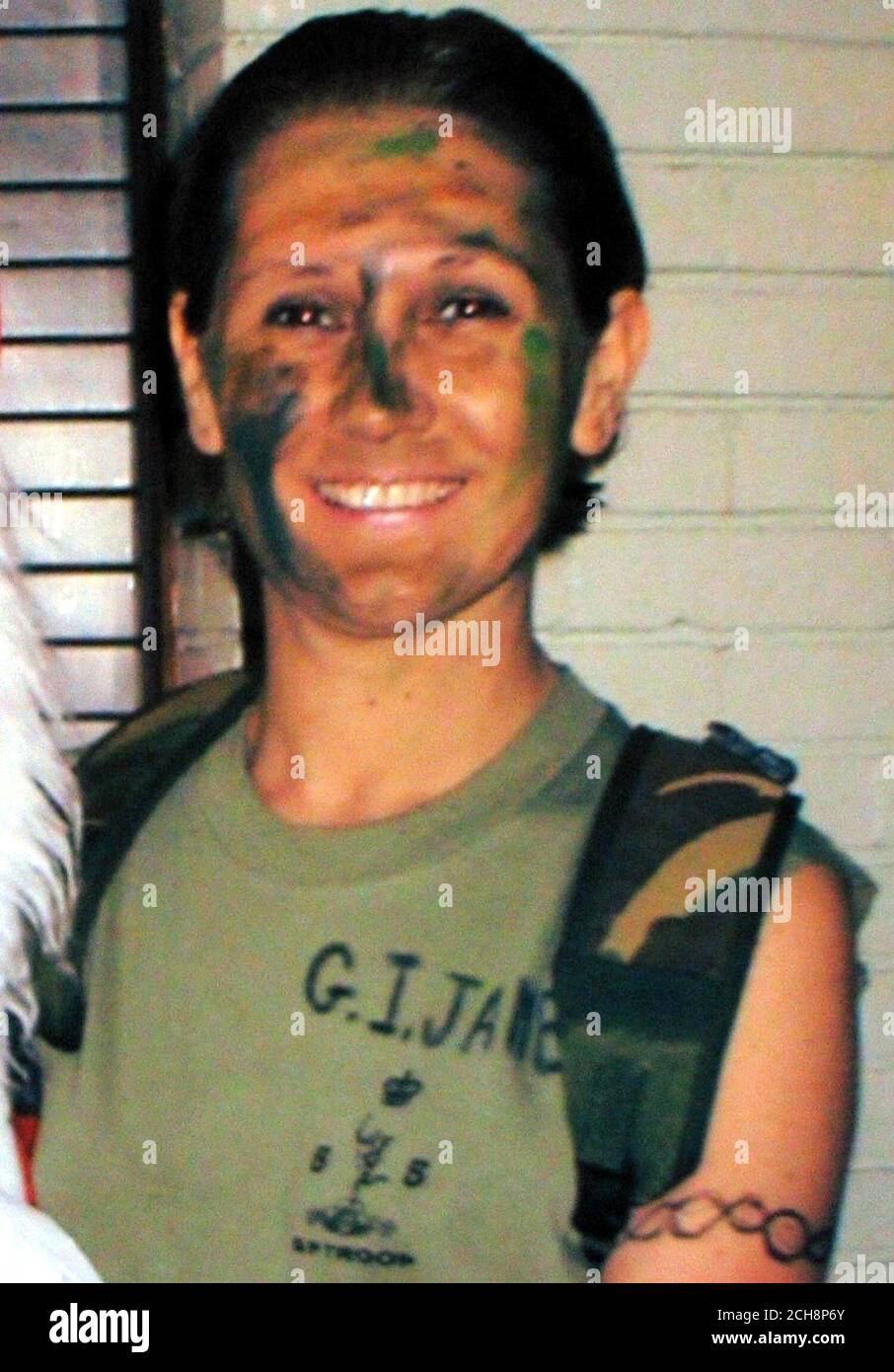 *BEST QUALITY AVAILABLE* Undated collect photo of Denise Halewood, 42, at fancy dress party, dressed as film character GI Jane. The mother-of-three fell to her death from a mountain while on a training expedition with the Territorial Army, it emerged Friday September 9, 2005. Denise Halewood, a sergeant in the 33 Signals Regiment, fell from Mount Rysy, in the Polish Tatra mountains, on July 14. The 42-year-old, from Liverpool, had reached the summit at 2499metres (8198ft) and was on her way down when the accident happened. See PA Story DEATH Army. PRESS ASSOCIATION Photo. Photo credit should Stock Photo